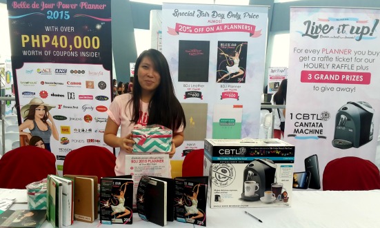 Leah Salvatierra of the BDJ Team can be seen manning the booth for their different planners and Elite Box.